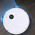 Robot aspirador TU SHOP ES330 blanco limpiando un suelo de madera