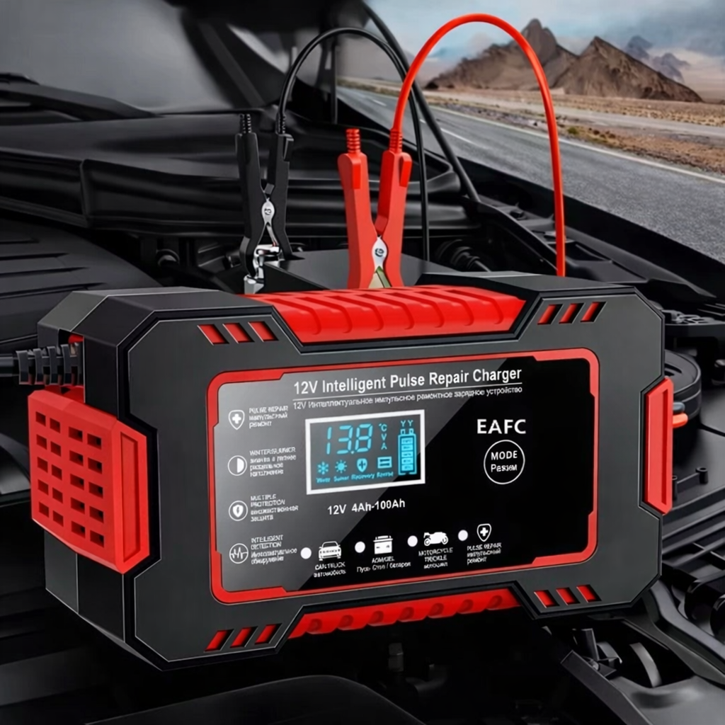 12V Intelligent Pulse Repair Charger by TU SHOP with red and black battery clamps.