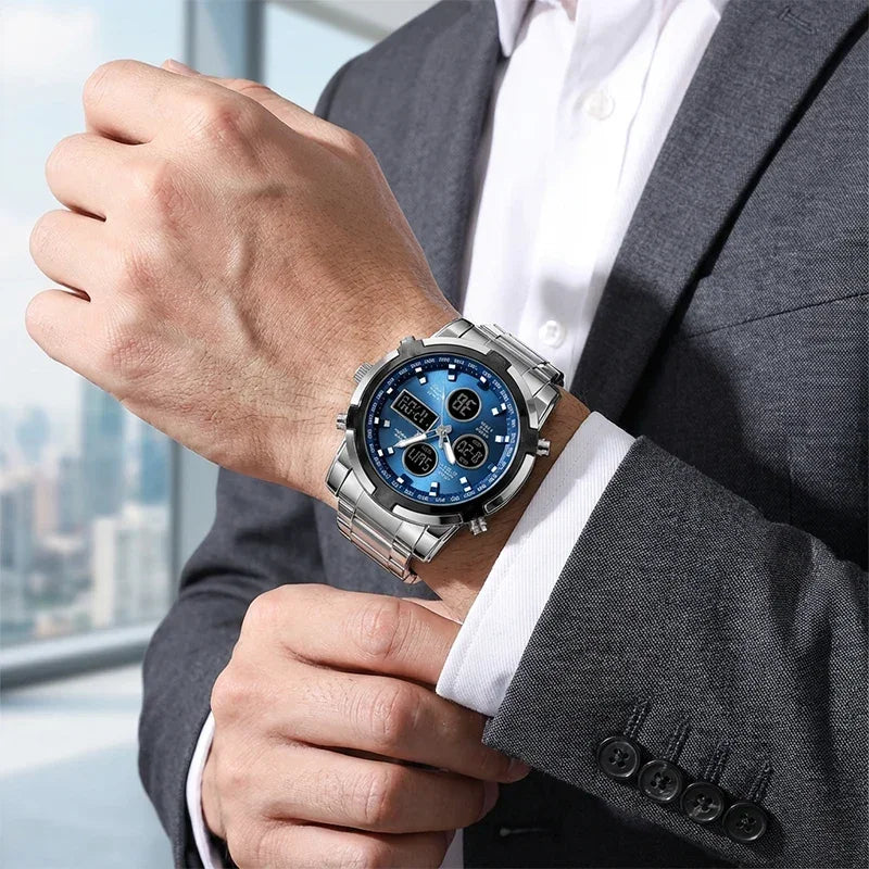 Man in a grey suit wearing a TU SHOP waterproof military style blue chronograph watch.